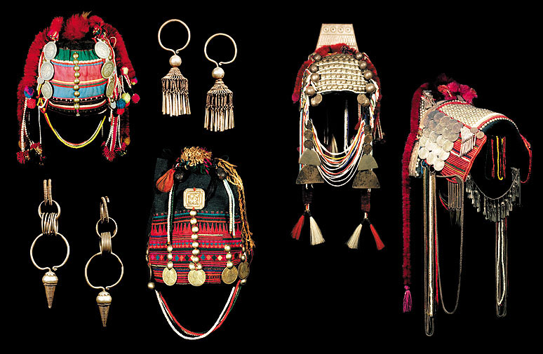 Two silver earrings pairs, two children’s headdresses, and two adult headdresses via tribalartasia.com